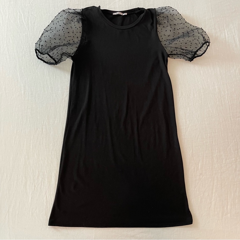 Black dress with polka dot sleeve detail